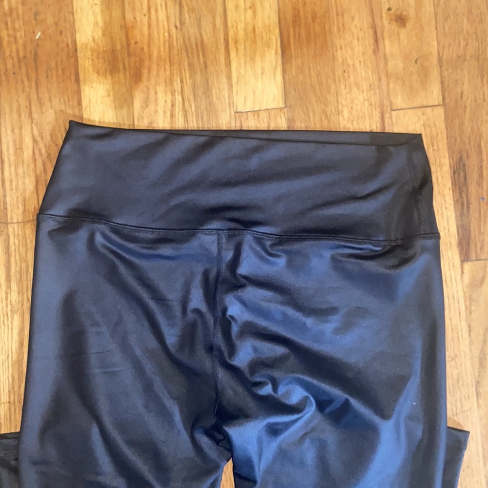 Black coated leggings. - Picture 2 of 2